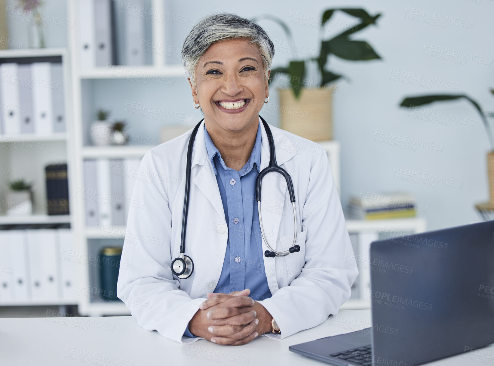 Buy stock photo Doctor, portrait and woman in healthcare office for consultation, support and services, planning or advice. Happy face of medical worker or senior person for health insurance in clinic or hospital