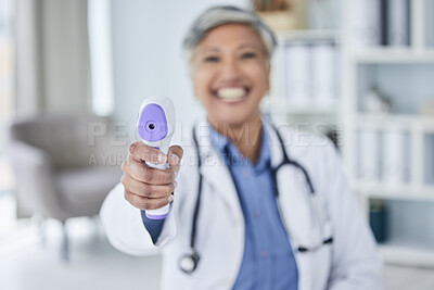 Buy stock photo Temperature, happy or doctor with thermometer for healthcare in hospital clinic or medical center. Senior woman blur, infrared laser test or mature nurse screening or checking fever, virus or disease