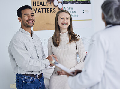 Buy stock photo Family, planning and pregnant couple with doctor in consultation office for healthcare exam. Pregnancy, hospital and people consulting female medical health expert for ivf care and clinic assessment