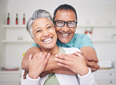 Buy stock photo Hug, love and happy with portrait of old couple for support, smile and relax. Happiness, kindness and peace with senior man and woman laughing at home for embrace, trust and retirement together