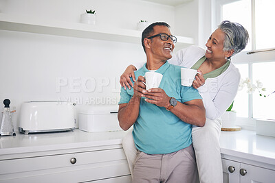Buy stock photo Love, coffee and happy with old couple in kitchen, for morning, relax and hug. Happiness, smile and peace with senior man and woman drinking tea at home for conversation, wake up and embrace