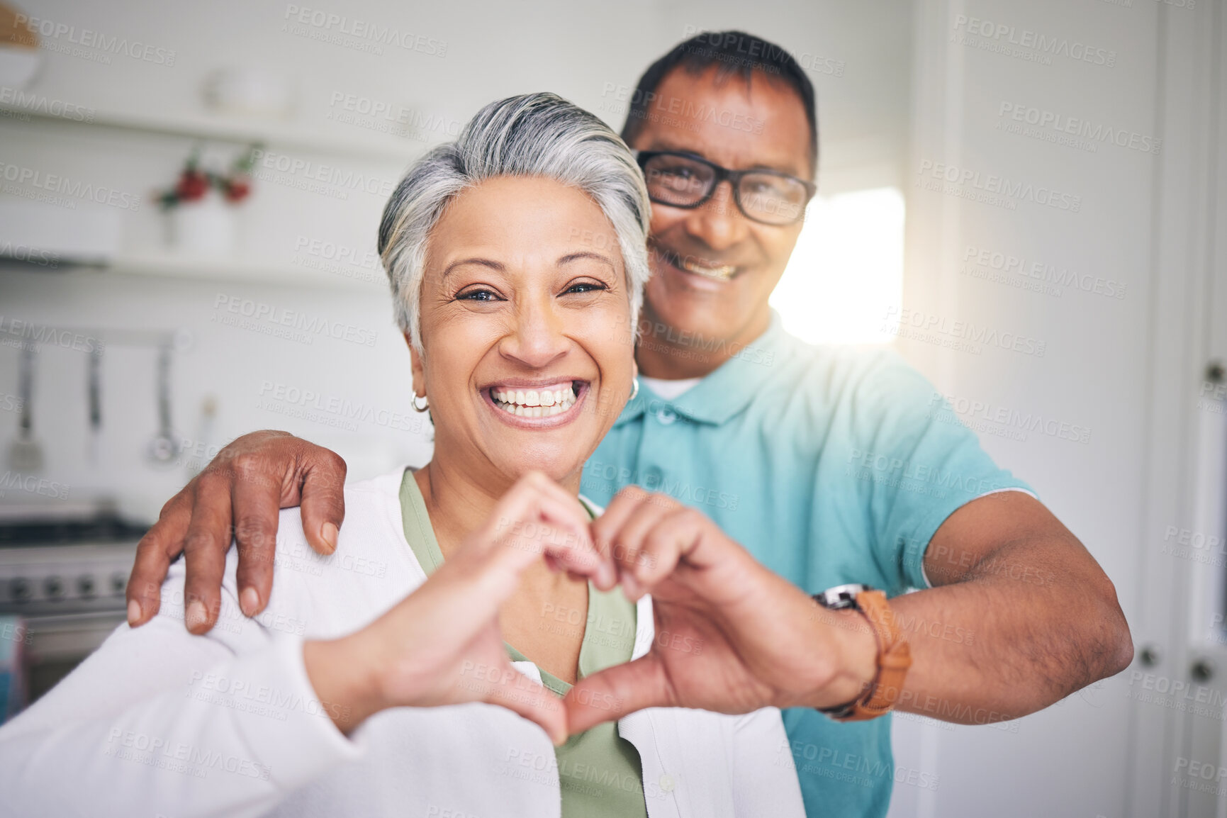 Buy stock photo Heart hands, love and smile with portrait of old couple for support, happy and relax. Happiness, kindness and peace with senior man and woman and gesture at home for embrace, trust and retirement
