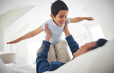 Buy stock photo Airplane, game and happy boy child with father on a bed with love, bonding and having fun in their home. Flying, playing and face of kid smile with parent in a bedroom with fantasy, plane or lift