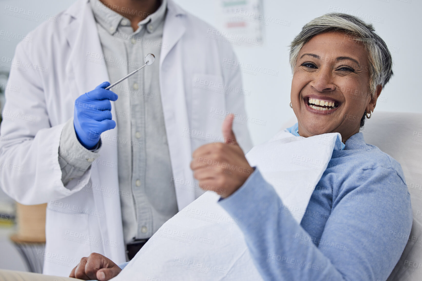 Buy stock photo Happy woman, teeth and thumbs up for dentist in dental care, appointment or checkup at clinic. Senior female person smile with like emoji or yes sign in tooth whitening, cleaning mouth or gum care