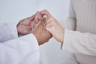 Buy stock photo Closeup, holding hands and doctor with a patient, support or cancer with treatment, healthcare or empathy. Zoom, medical professional or woman with test results, consulting or help with hope or trust