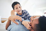 Family, boy portrait and hug with fun and smile in a home with bonding and parent care. Happy, house and bedroom with a father and young child together playing in the morning with dad and kid 