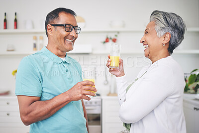 Buy stock photo Happiness, senior couple and juice with love in kitchen for bonding in retirement or morning. Marriage, home and elderly man or woman with beverage with conversation together for quality time.