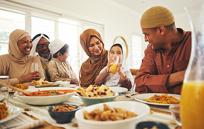 Buy stock photo Food, love and muslim with big family at table for eid mubarak, Islamic celebration and lunch. Ramadan festival, culture and iftar with people eating at home for fasting, islam and religion holiday
