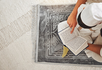 Buy stock photo Quran, Islam child and parent on floor reading for religion learning, muslim pray and faith in Allah, god or holy spirit. Knowledge, home top view and father teaching kid worship, praying and respect