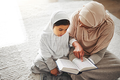 Buy stock photo Quran, Islamic and mother and child prayer to Allah, god or holy spirit for Arabic religion, faith and learning to pray. Spiritual worship book, home Muslim family and praying mom teaching young kid
