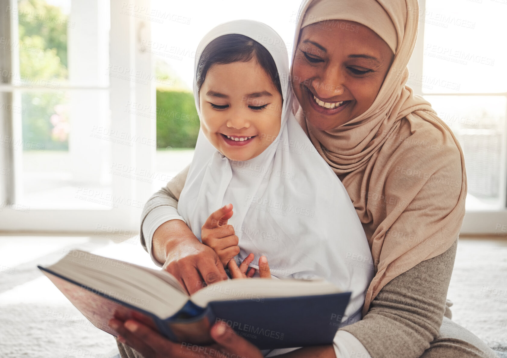 Buy stock photo Quran, Muslim child or happy grandmother reading for learning, Islamic knowledge and hope in Allah, god or culture. Religion book, home or senior Arab woman teaching kid worship, respect or gratitude