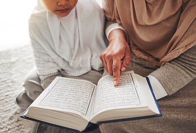 Buy stock photo Quran, Muslim child or parent hands reading for learning, Islamic knowledge and faith in Allah, god or culture. Spiritual books, home closeup or Arab person teaching kid worship, prayer or gratitude