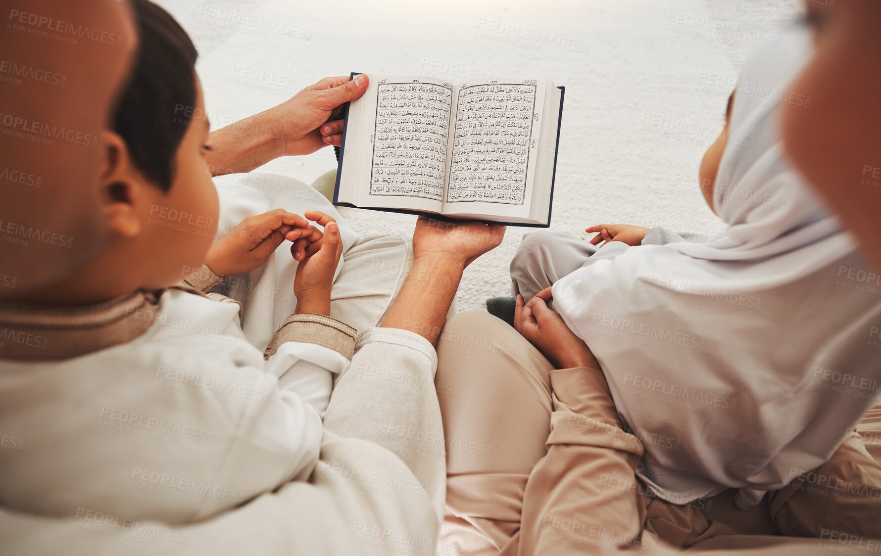 Buy stock photo Quran, Muslim children and parents reading, learning and help kids with religion prayer, Islamic study and faith in Allah. Spiritual book, home or people teaching, support and youth child pray to God