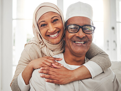 Buy stock photo Portrait, Muslim and elderly couple smile, hug and happy for support, trust and care in retirement, bonding or marriage. Face, home and Islamic man, woman and elderly people together for quality time