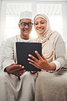 Tablet video call, Muslim and happy elderly couple talking, speaking and on online communication. Global networking, Islam home and Arab man, woman or senior people consulting on virtual conversation
