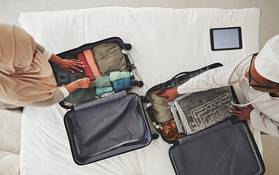 Buy stock photo Travel, bedroom and Muslim couple with suitcase packing for holiday, vacation and religious trip. Home, luggage and above of man and woman with clothes in bag for journey, adventure and tourism