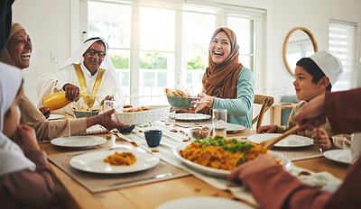 Buy stock photo Food, funny and muslim with big family at table for eid mubarak, Islamic celebration and lunch. Ramadan festival, culture and iftar with people laughing at home for fasting, islam or religion holiday