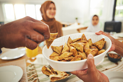 Buy stock photo Food, samosa and muslim with hands of people at table for eid mubarak, Islamic celebration and lunch. Ramadan festival, culture and iftar with closeup of family at home for fasting, islam or religion