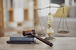 Background, gavel and law books with scales on table of judge, attorney and court trial. Closeup of legal hammer, notebook or desk of lawyer in constitution, equality and human rights of fair justice