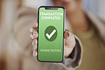 Hands, person and phone screen with transaction completed for ecommerce, finance or digital money. Closeup, smartphone and payment received on mobile, online shopping app or fintech financial service