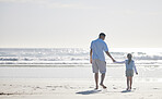 Beach, holding hands and father and kid walking for outdoor peace, freedom and fresh air on vacation holiday. Sea water, mockup ocean view and back of family, dad and young child bond, relax and care