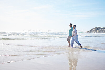 Buy stock photo Beach, walking and senior couple holding hands for bonding, quality time and relax in nature. Love, retirement and happy elderly man and woman by ocean on holiday, vacation and travel in morning