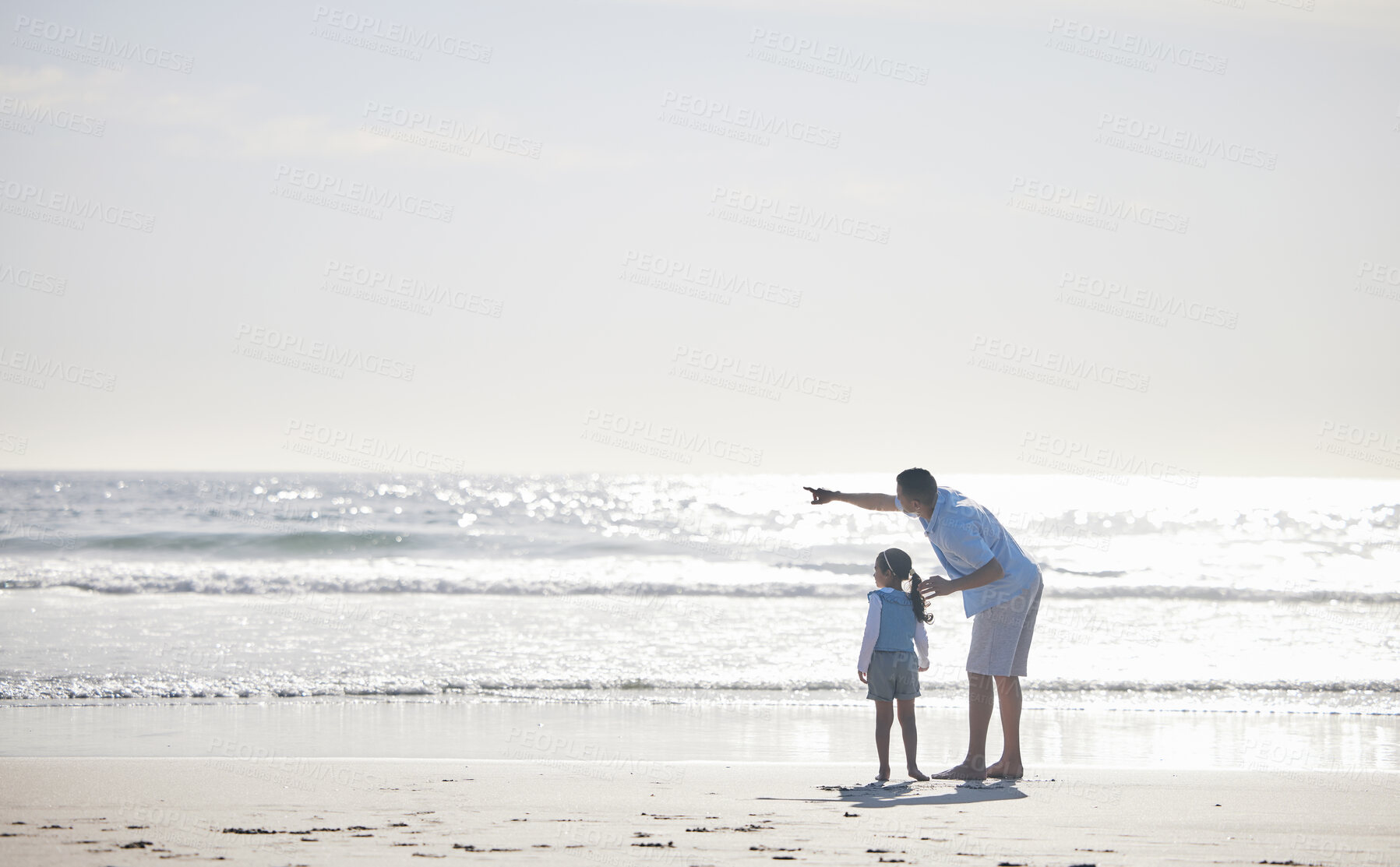 Buy stock photo Beach, pointing and family father and child relax, enjoy outdoor wellness, and freedom on Brazil vacation. Ocean sea water, mockup sky and back of dad and young kid gesture at nature space on holiday