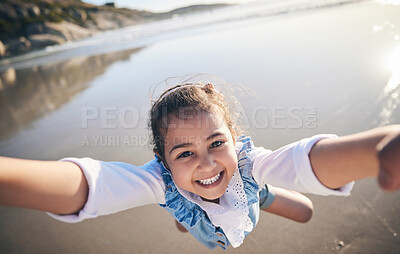 Buy stock photo Person, spinning girl and pov at beach, portrait and smile for game, excited face and playing by sea in sunshine. Parent, young child and swing with speed, love or bonding with holding hands by ocean