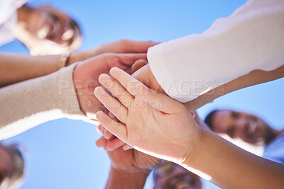 Buy stock photo People, hands together and teamwork below in support for trust, bonding or unity and collaboration outdoors. Low angle of family or friends piling hand for team building, community or goals outside