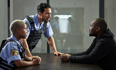 Buy stock photo Police, criminal and handcuffs for interrogation, justice or arrest in fraud, scam or crime. Law enforcement officers talking to prisoner, gangster or thief in question for robbery in prison or jail