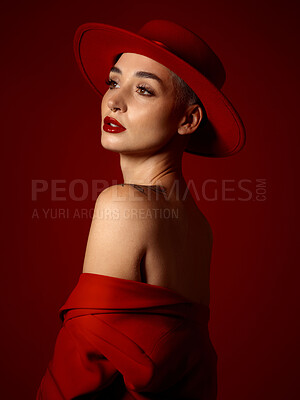 Buy stock photo Mindset, fashion and a model woman on a red studio background for elegant or trendy style. Future, vision and beauty with a young female person thinking in an edgy or classy outfit for aesthetic art