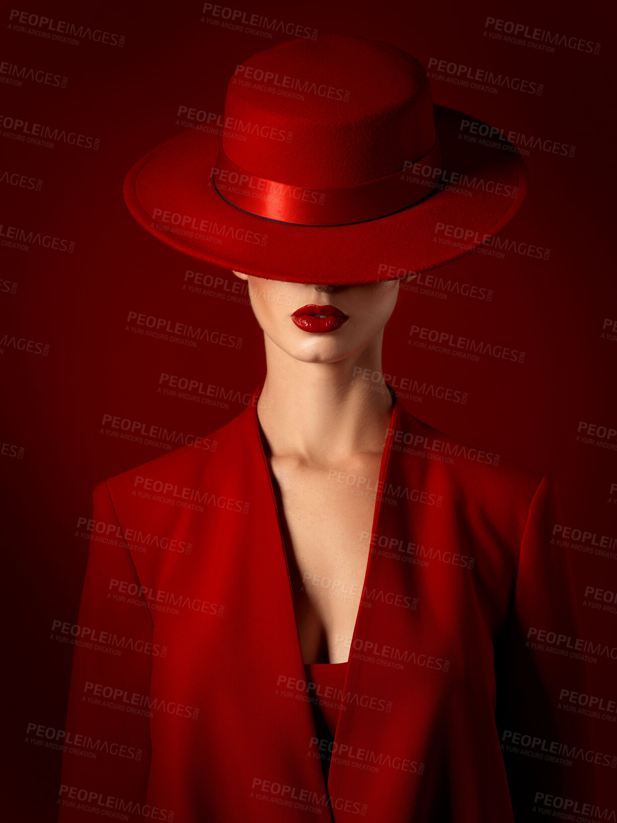 Buy stock photo Vintage, fashion and woman in a suit or hat in studio with retro, style and edgy, confident or creative pose on red background. Mystery character, model and girl with power, beauty or aesthetic