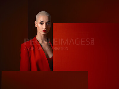 Buy stock photo Portrait, fashion and serious woman in red suit in studio isolated on a background mockup space. Face, makeup and model with cosmetics, aesthetic or stylish, trendy or classy clothes from Switzerland