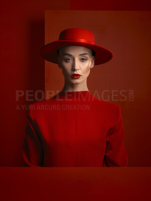 Buy stock photo Portrait, fashion and space with a woman in red on a studio background for marketing, advertising or branding. Reverse, style or a trendy young female person standing with empty or blank mockup