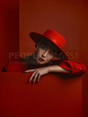 Buy stock photo Fashion, portrait and a vintage woman on a red background for a sexy or creative aesthetic. Retro, rich and an elegant, classy or stylish model or girl with cosmetics isolated on a studio backdrop