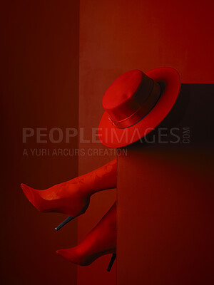 Buy stock photo Red heels, hat and feet in studio, sexy and aesthetic for retro couture design, luxury clothes or mystery by background. Stiletto shoes, fedora and relax with high fashion, elegance and vintage style