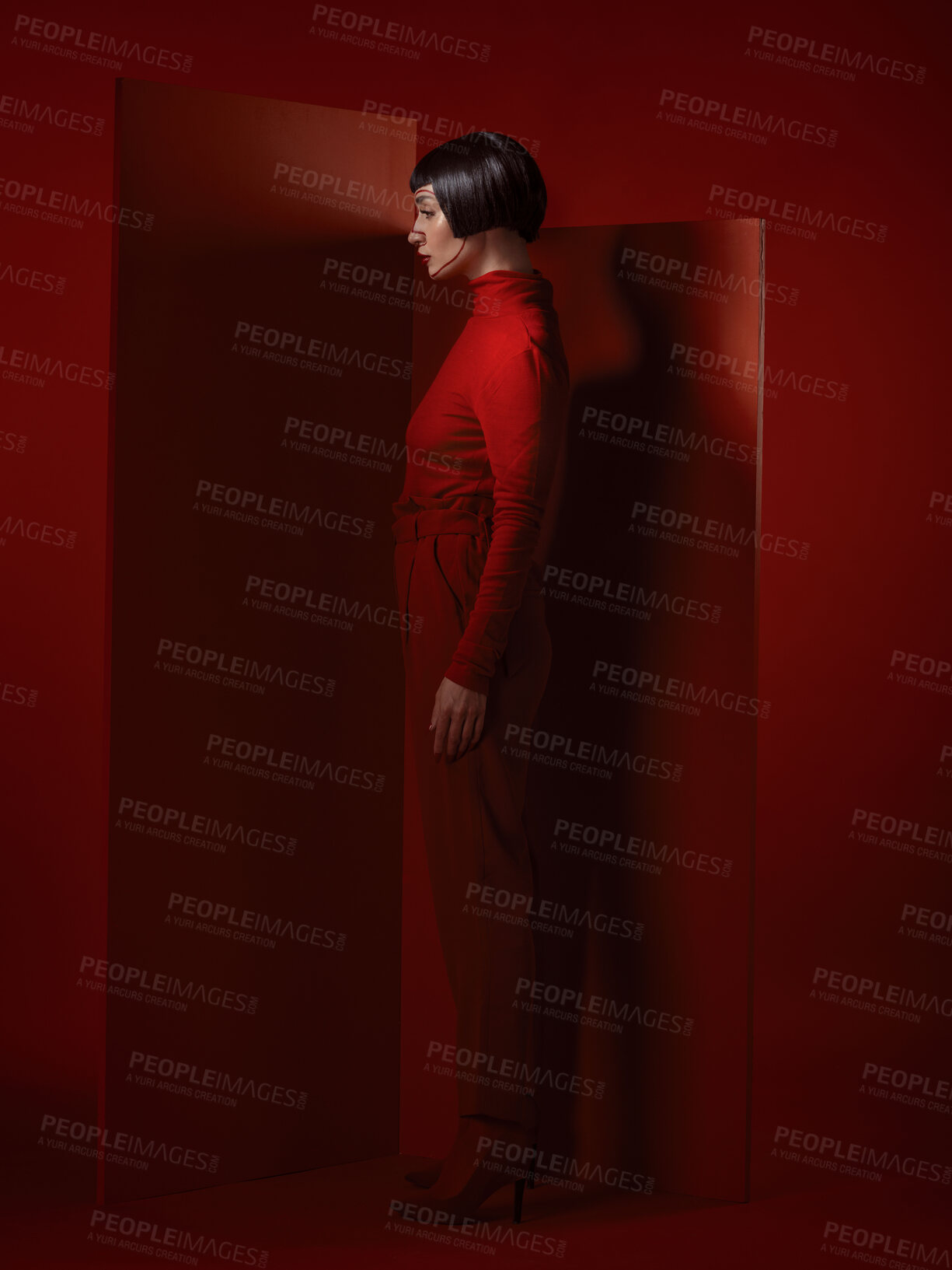 Buy stock photo Future fashion, art and woman with red makeup and unique studio background with retro cosmetics. Futuristic aesthetic, shadow and creative beauty, body of model in dark luxury designer brand mockup.