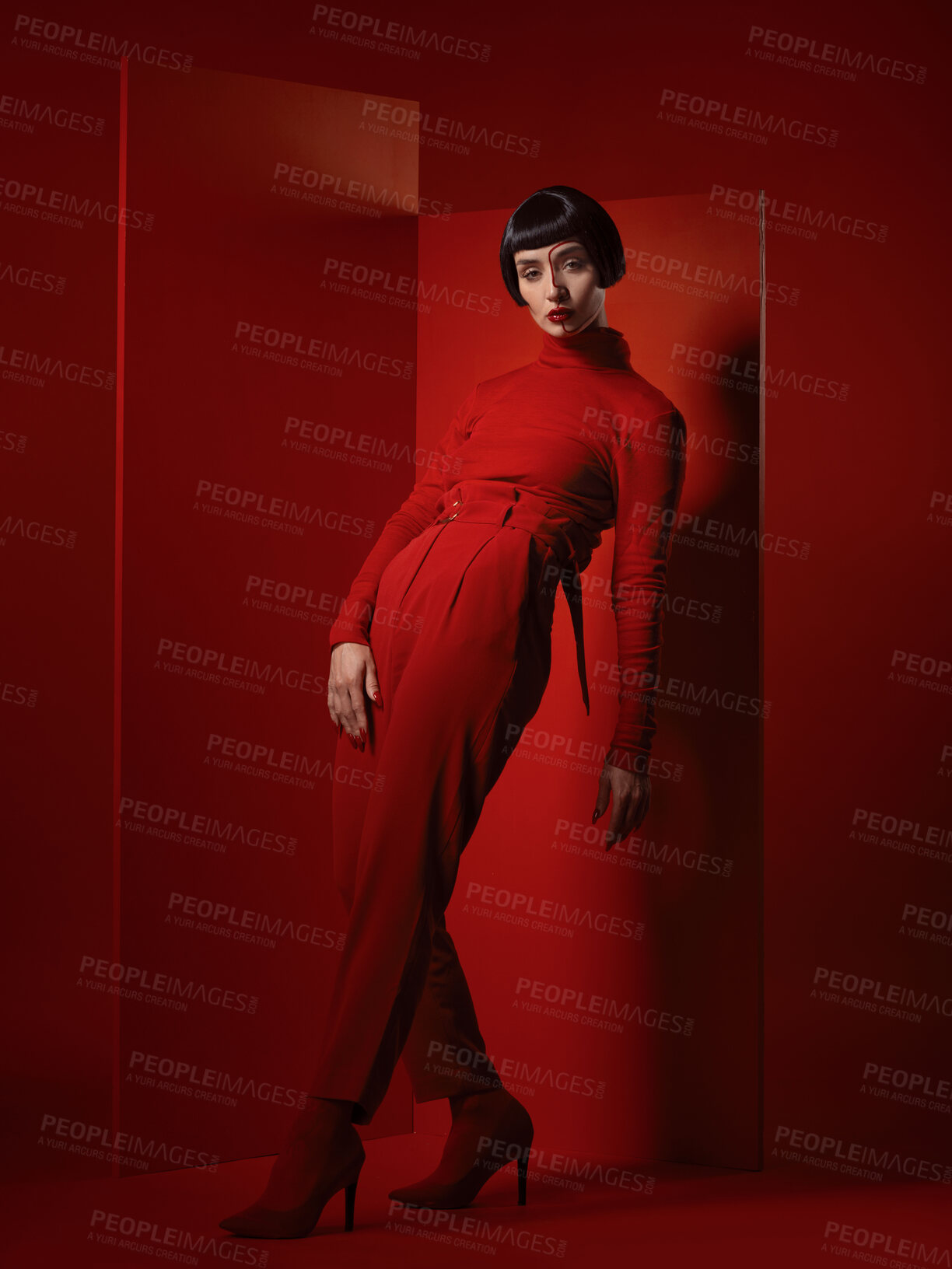 Buy stock photo Fashion, retro and portrait of a woman on a red background for a sexy, creative and vintage aesthetic. Pose, luxury and a model in clothing with wealth and makeup isolated on a studio backdrop