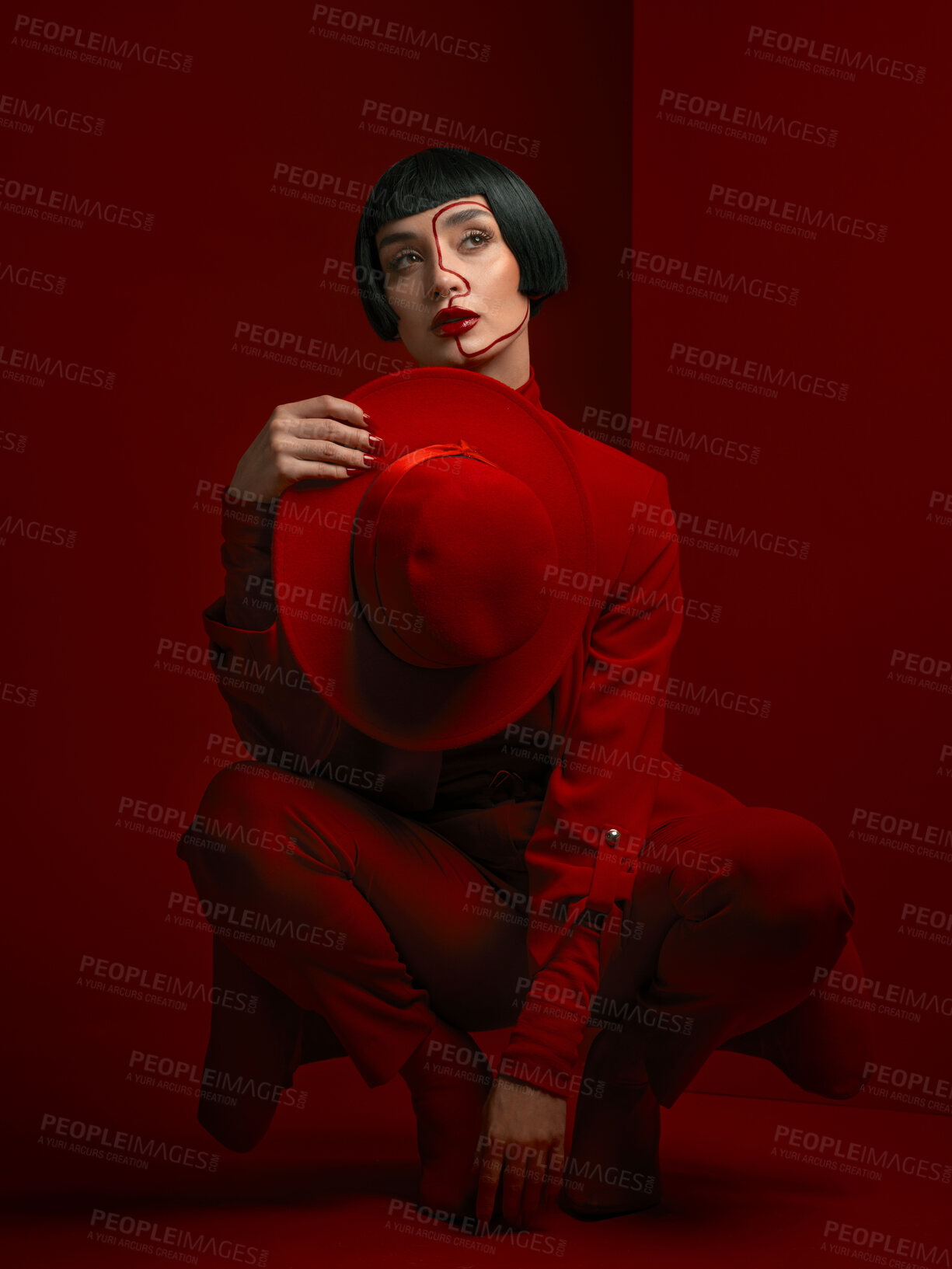 Buy stock photo Woman, fashion and art deco, red aesthetic with beauty and  makeup with vintage style shine on studio background. Female model, thinking and bold cosmetics, female model with glamour and creative