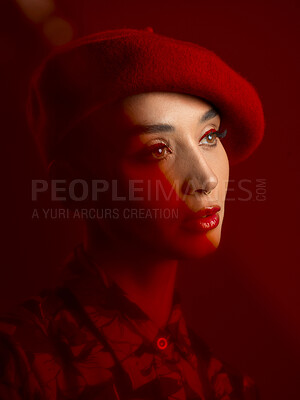 Buy stock photo Woman, fashion and makeup with red aesthetic, beauty and art deco with vintage hat isolated on studio background. Retro style, female model with thinking face and cosmetics, attractive and bold
