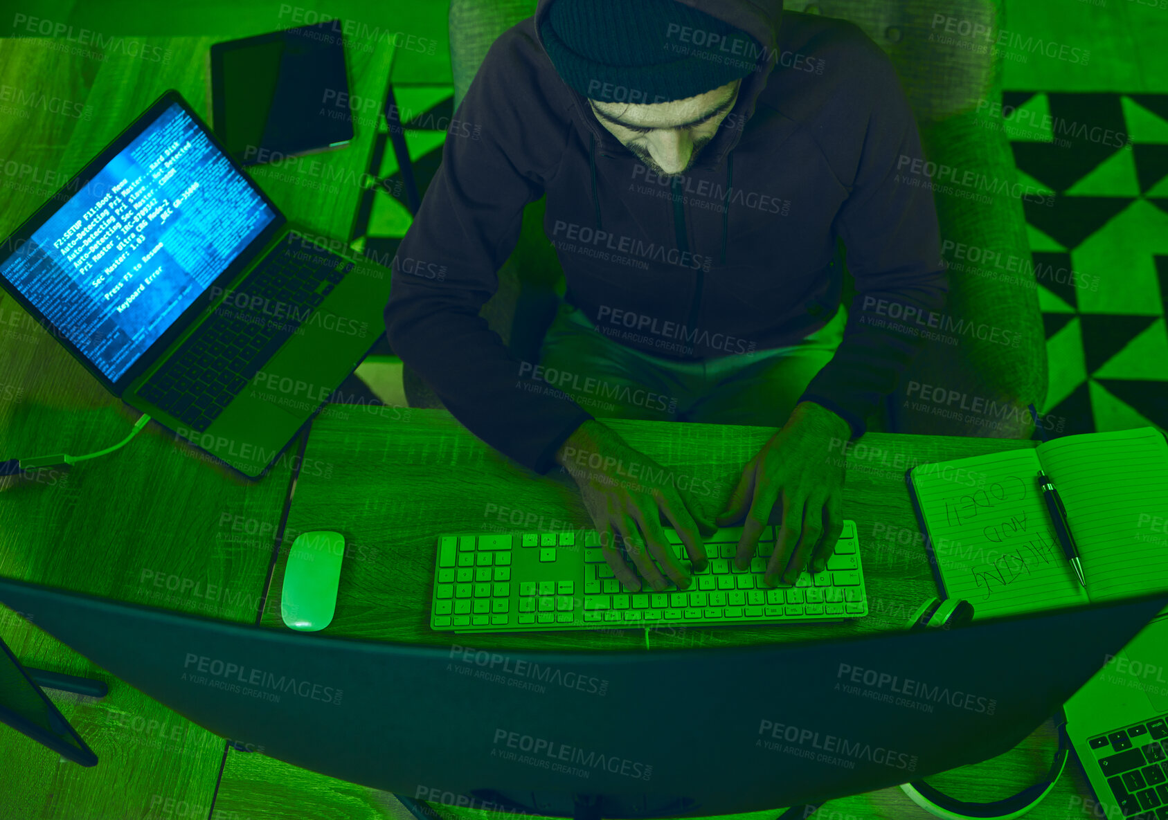 Buy stock photo Cybersecurity, crime and man programming from above in neon office with code, fraud and hacking. Software, ransomware and web hacker on cyber attack, password thief coding online scam and computer.