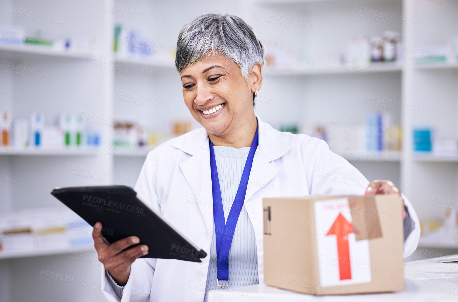 Buy stock photo Happy woman, pharmacist and tablet in logistics with box for online order, delivery or shipping at pharmacy. Senior female person in medical healthcare for ecommerce or pharmaceuticals on technology