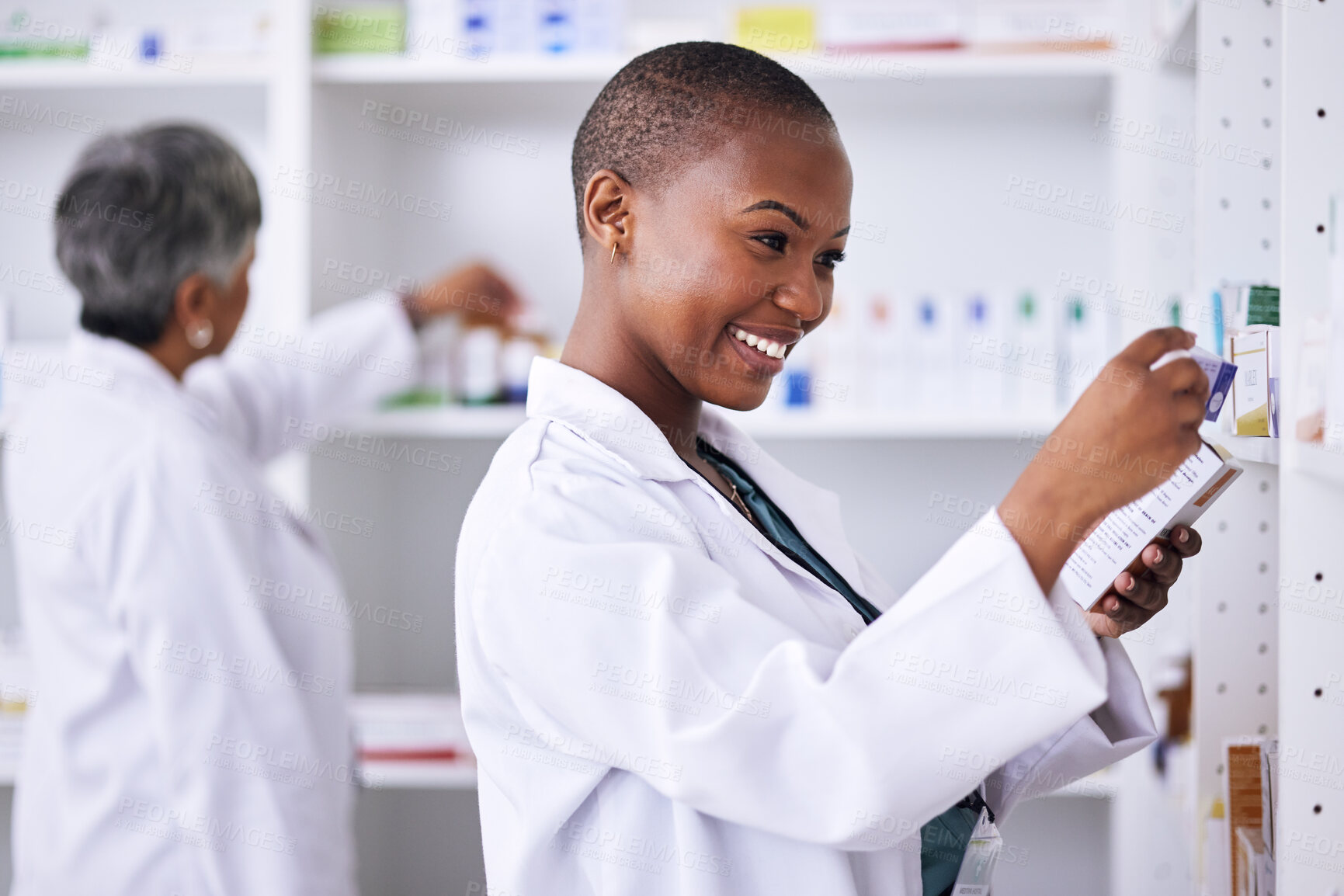 Buy stock photo Happy black woman, pharmacist and pills for inventory inspection or checking stock on shelf at pharmacy. African female person in medical healthcare with pharmaceutical product for medication storage