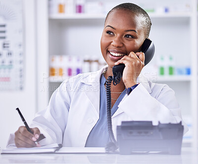 Buy stock photo Black woman, pharmacist and phone call for Telehealth, consultation or customer support at the pharmacy. Happy African female person, medical or healthcare professional talking on telephone at clinic