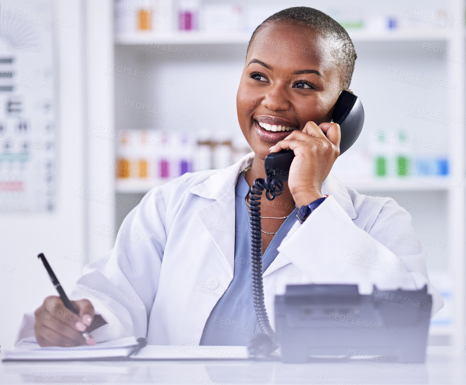 Buy stock photo Black woman, pharmacist and phone call for Telehealth, consultation or customer support at the pharmacy. Happy African female person, medical or healthcare professional talking on telephone at clinic