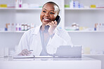 Black woman, pharmacist and phone call on mockup space for Telehealth or consultation at the pharmacy. Happy African female person, medical or healthcare professional talking on telephone at clinic