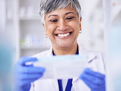 Buy stock photo Happy, pharmacist or senior woman with medication, package and smile with treatment. Mature lady, female person or healthcare professional with happiness, medical or pharmacy with employee or reading