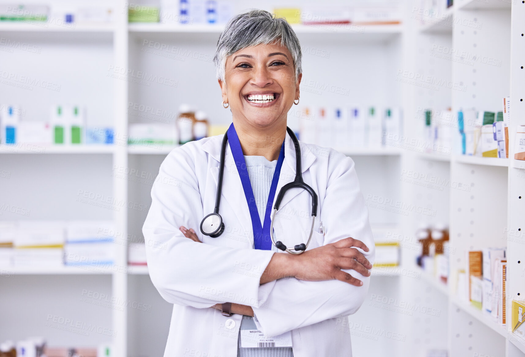 Buy stock photo Senior woman, pharmacist with arms crossed or portrait of doctor in pharmacy, pharmaceutical store or shop for healthcare. Medicine, consultation on health and confident in medical advice on pills