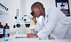 Microscope, science and black woman in laboratory to check research, medical analysis and study biotechnology. Female scientist, microbiology and investigation of innovation, dna test and development