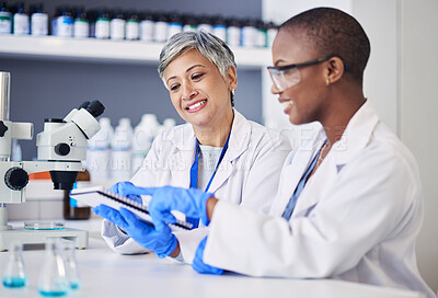 Buy stock photo Women, science and teamwork with notes in laboratory for research, medical analysis and biotech discussion. Happy female scientists planning microbiology investigation, feedback and review paperwork